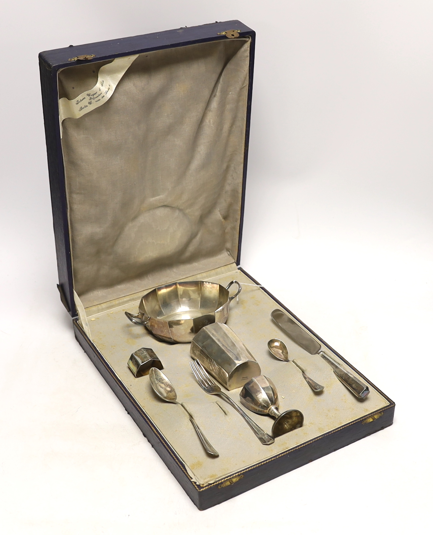 A cased matched 800 standard German eight piece breakfast set, gross weight 9.5oz.